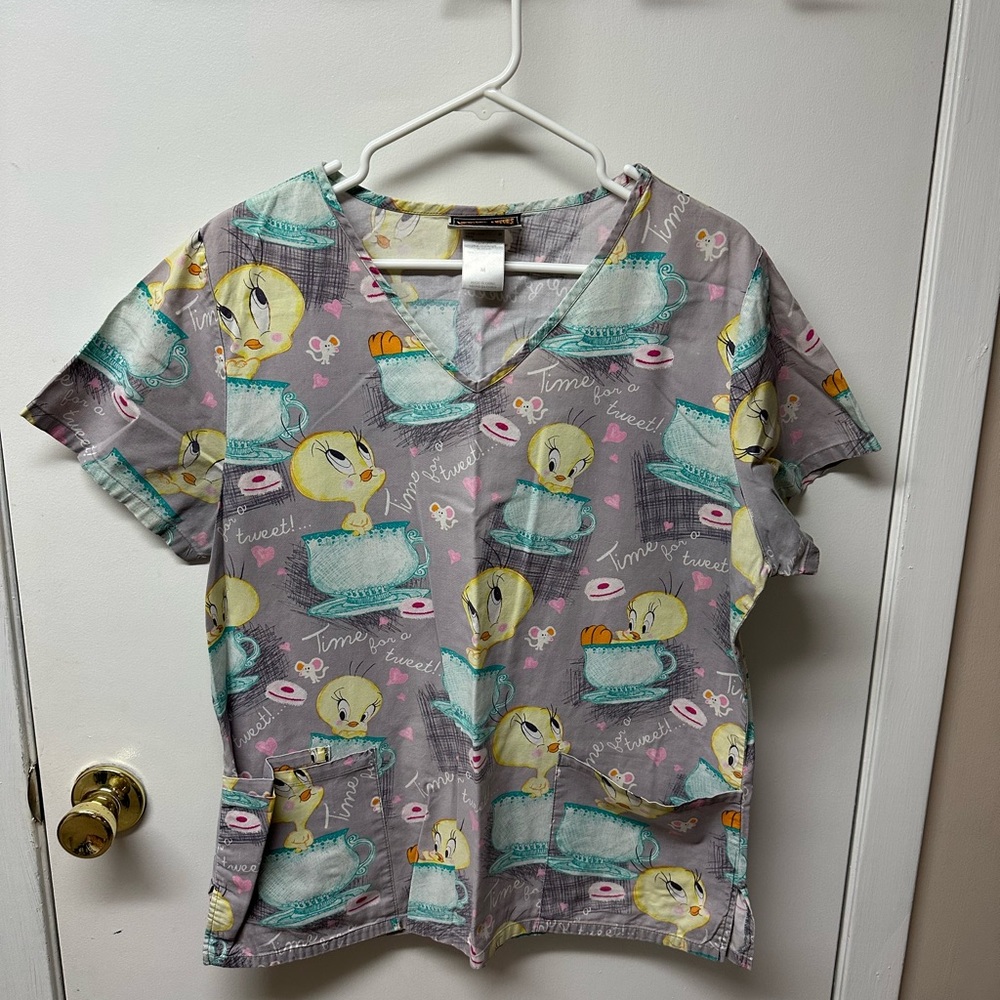 Women’s scrub top, excellent condition.